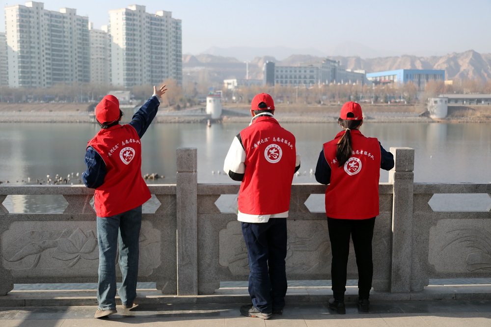 展板九:為候鳥投食.JPG 展板九:為候鳥投食.JPG
